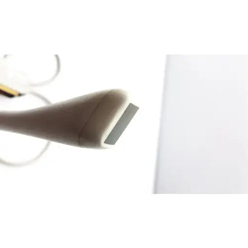 Beige handheld epilator with sleek ergonomic design and metallic head for siemens acuson ev7 linear probe use