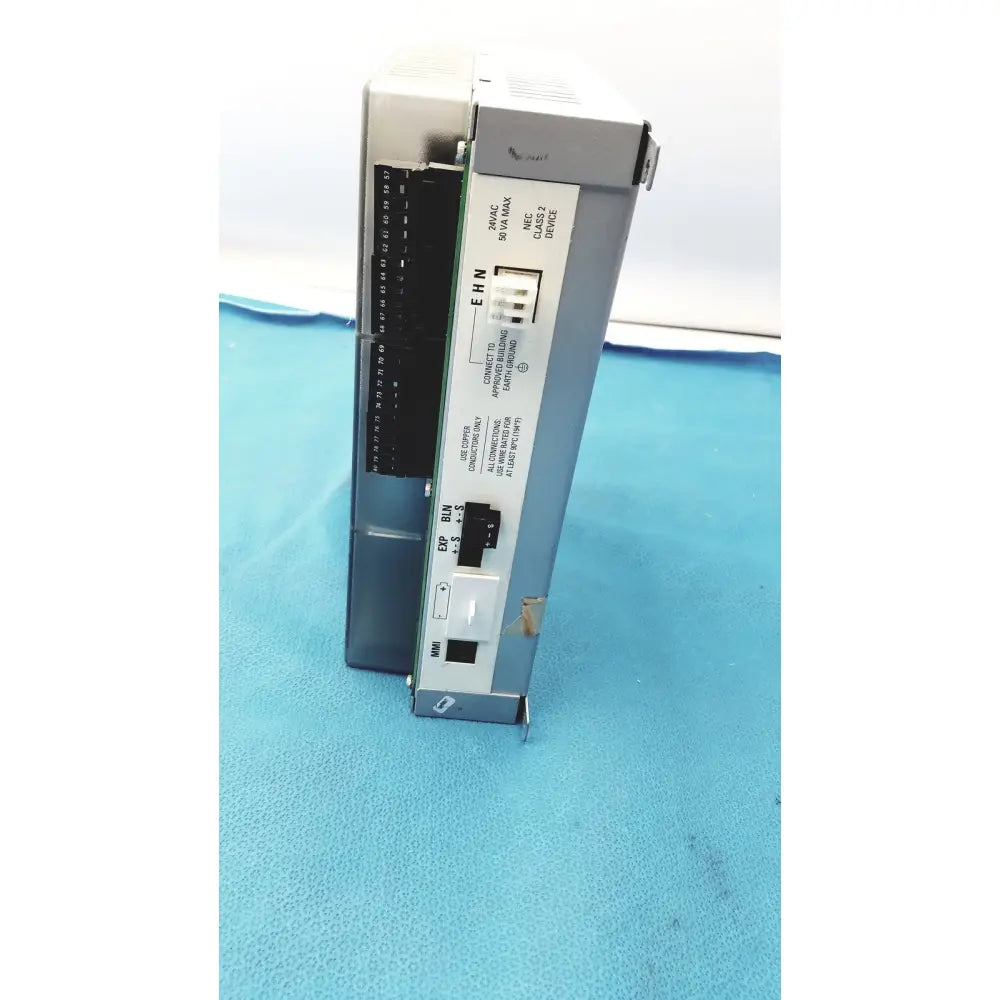 Gray metallic siemens apogee automation 549-627 1210 modular equipment controller with labeled ports and connectors