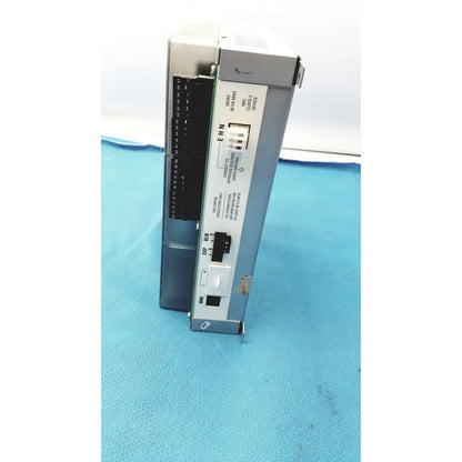 Gray metallic siemens apogee automation 549-627 1210 modular equipment controller with labeled ports and connectors