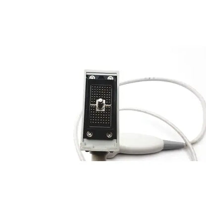Gray rectangular siemens b1b0059 ultrasound transducer with black grid pattern and silver screws connected to white cable