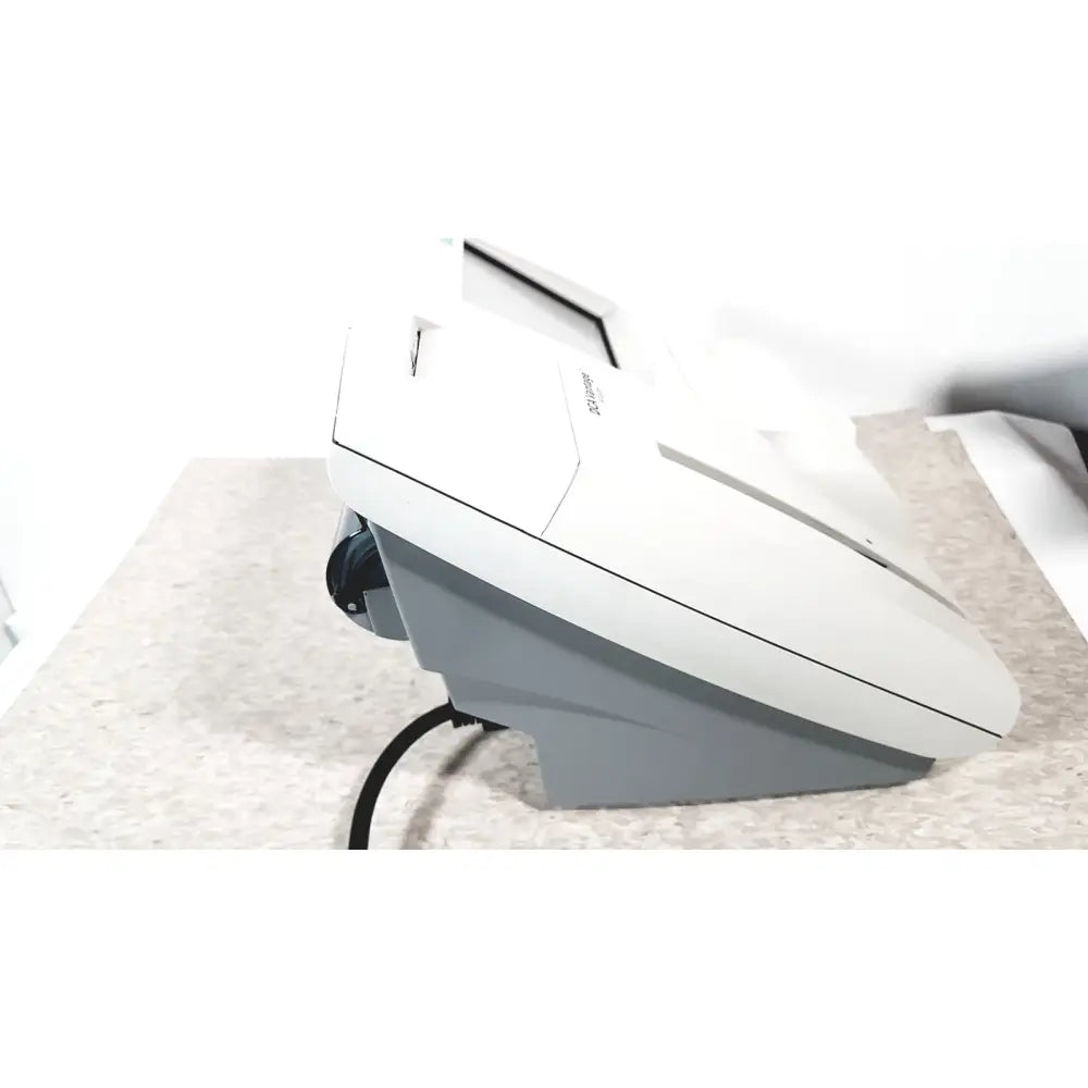White and gray sleek desktop scanner siemens dca vantage analyzer version 4.4 ref 06489205 for laboratory use