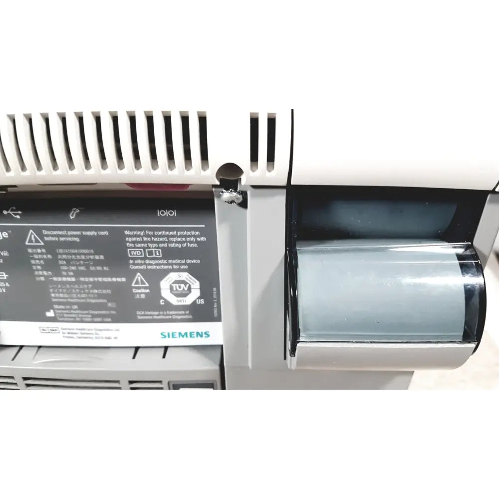 White Siemens DCA Vantage analyzer with a translucent gray roll of material in its compartment version 4.4 ref 06489205