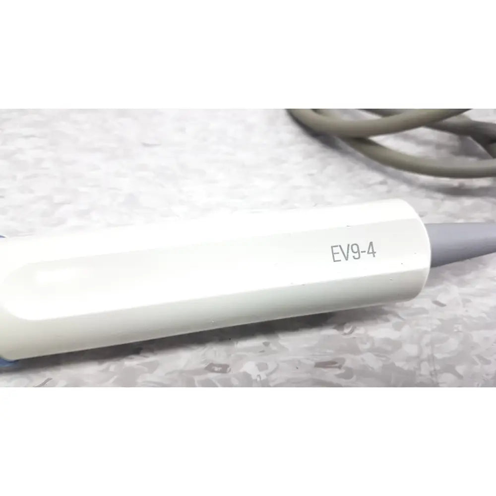 White plastic Siemens ev9-4 endocavity ultrasound transducer probe with gray tip and ev9-4 engraved on side