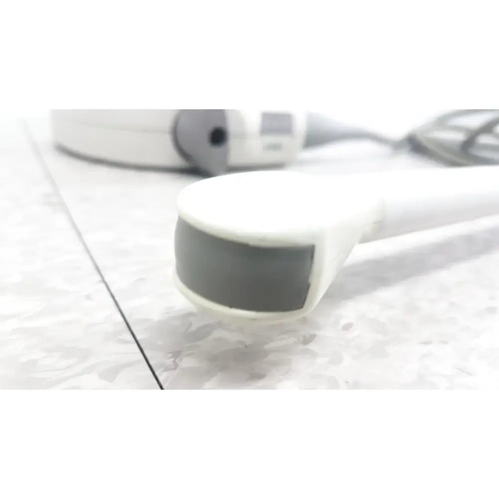 White handheld siemens ev9-4 endocavity ultrasound transducer probe with gray rectangular sensor face for medical imaging