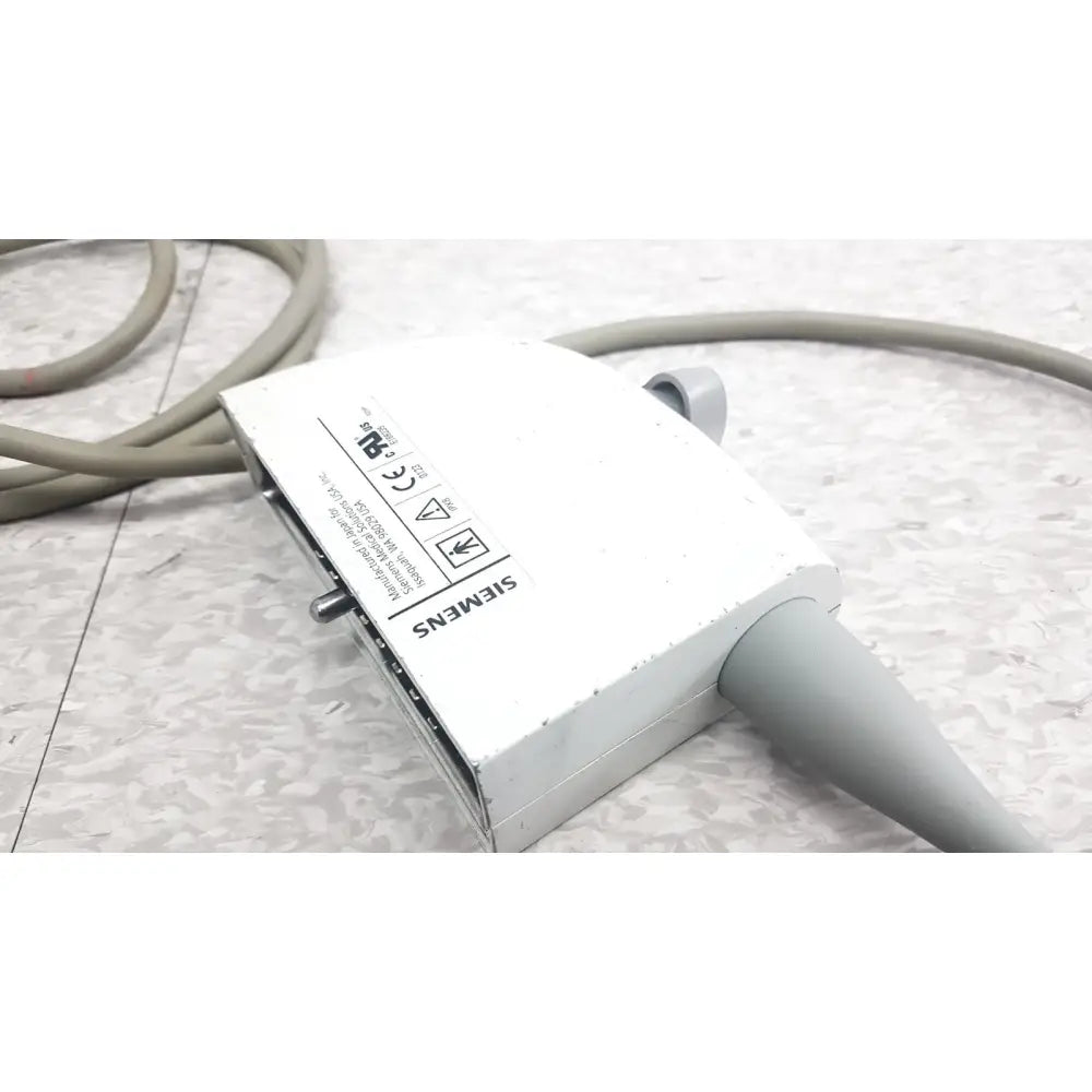 White Siemens ev9-4 endocavity ultrasound transducer probe with gray connectors and textured surface for medical imaging