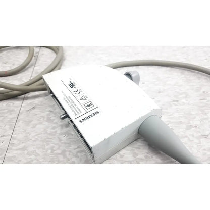White Siemens ev9-4 endocavity ultrasound transducer probe with gray connectors and textured surface for medical imaging