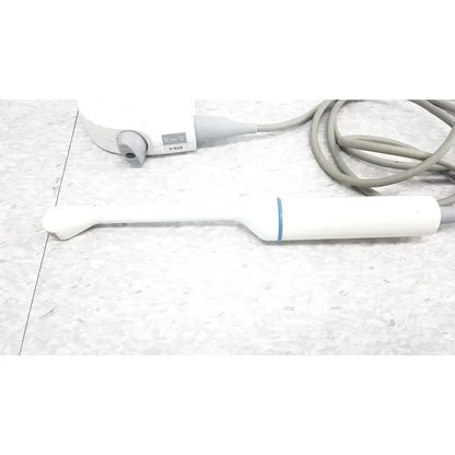 Siemens EV9-4 endocavity ultrasound transducer probe white with blue accent and gray cable on speckled floor surface