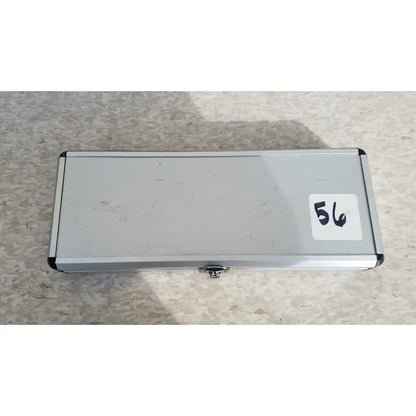 Silver hard protective aluminum case with small lock and white sticker number 56 for secure storage