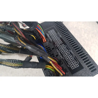 Black textured silverstone 1200w strider gold power supply unit with labeled connector panel and bundled colorful cables