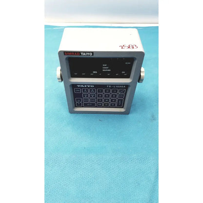 Gray simrad taiyo td-l1550a synthesized vhf automatic marine radar unit with black display keypad and silver side knobs
