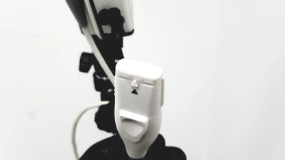 White plastic camera remote shutter release with black triangular buttons for site rite prevue ultrasound system use