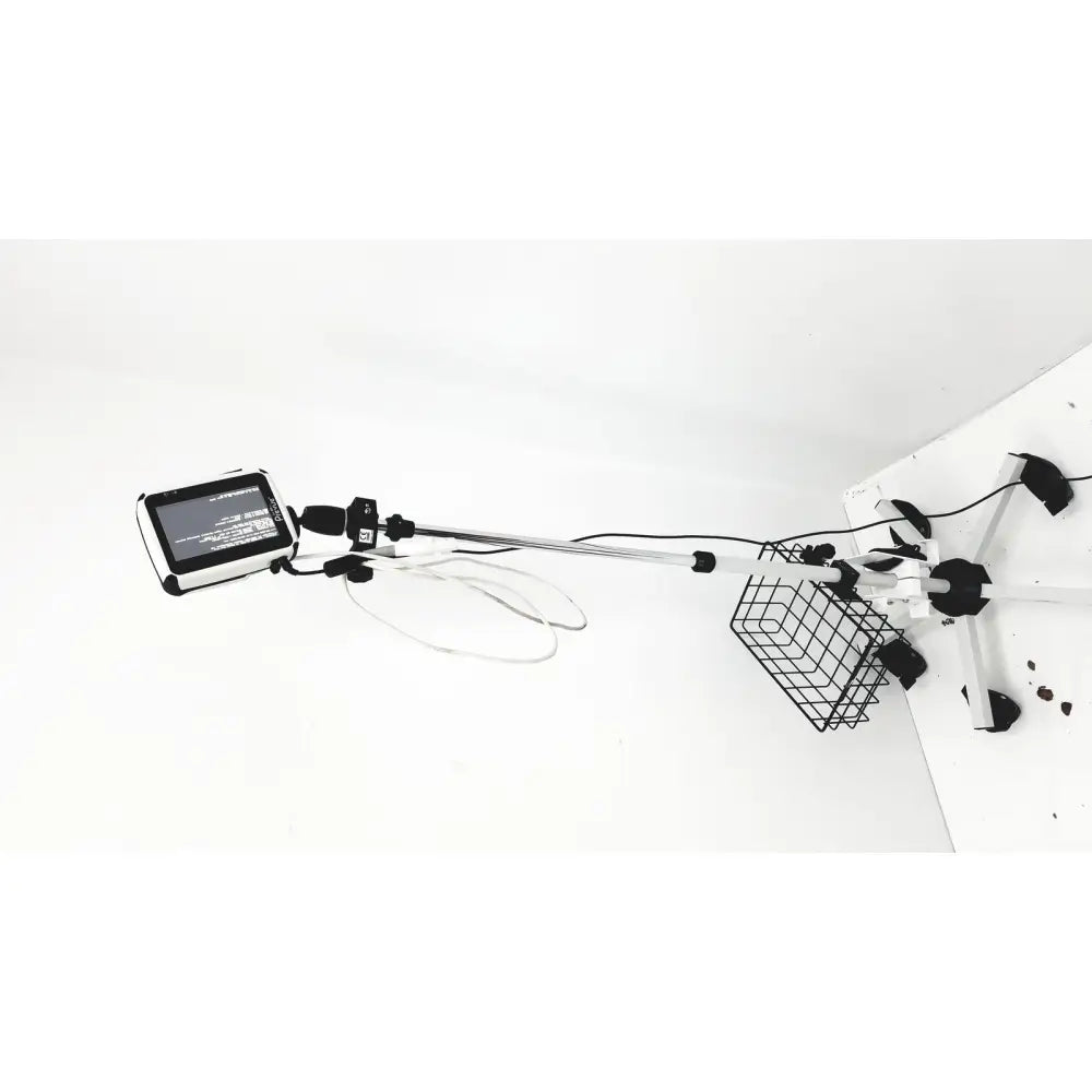 White tablet mounted on telescopic pole with wire basket on base in site rite prevue ultrasound rolling cart system