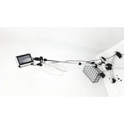 White tablet mounted on telescopic pole with wire basket on base in site rite prevue ultrasound rolling cart system