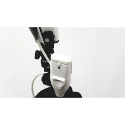 White plastic camera remote shutter release with black triangular buttons for site rite prevue ultrasound system use