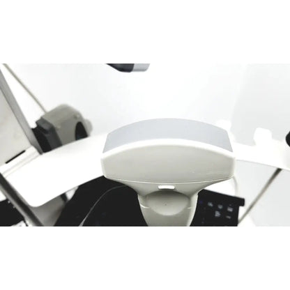 White plastic site rite vision ultrasound device with curved top and small rectangular front button on rolling cart extras