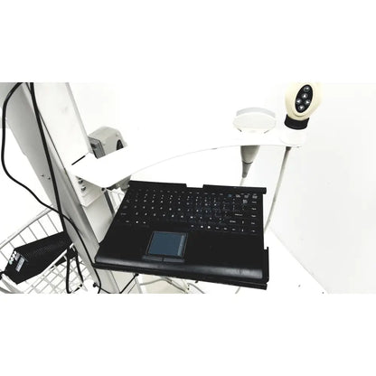 Black laptop with integrated touchpad and keyboard on white adjustable desk mount of site rite vision ultrasound system