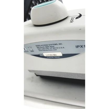 White plastic site rite vision ultrasound system device with teal knob and black lock label by bard access systems