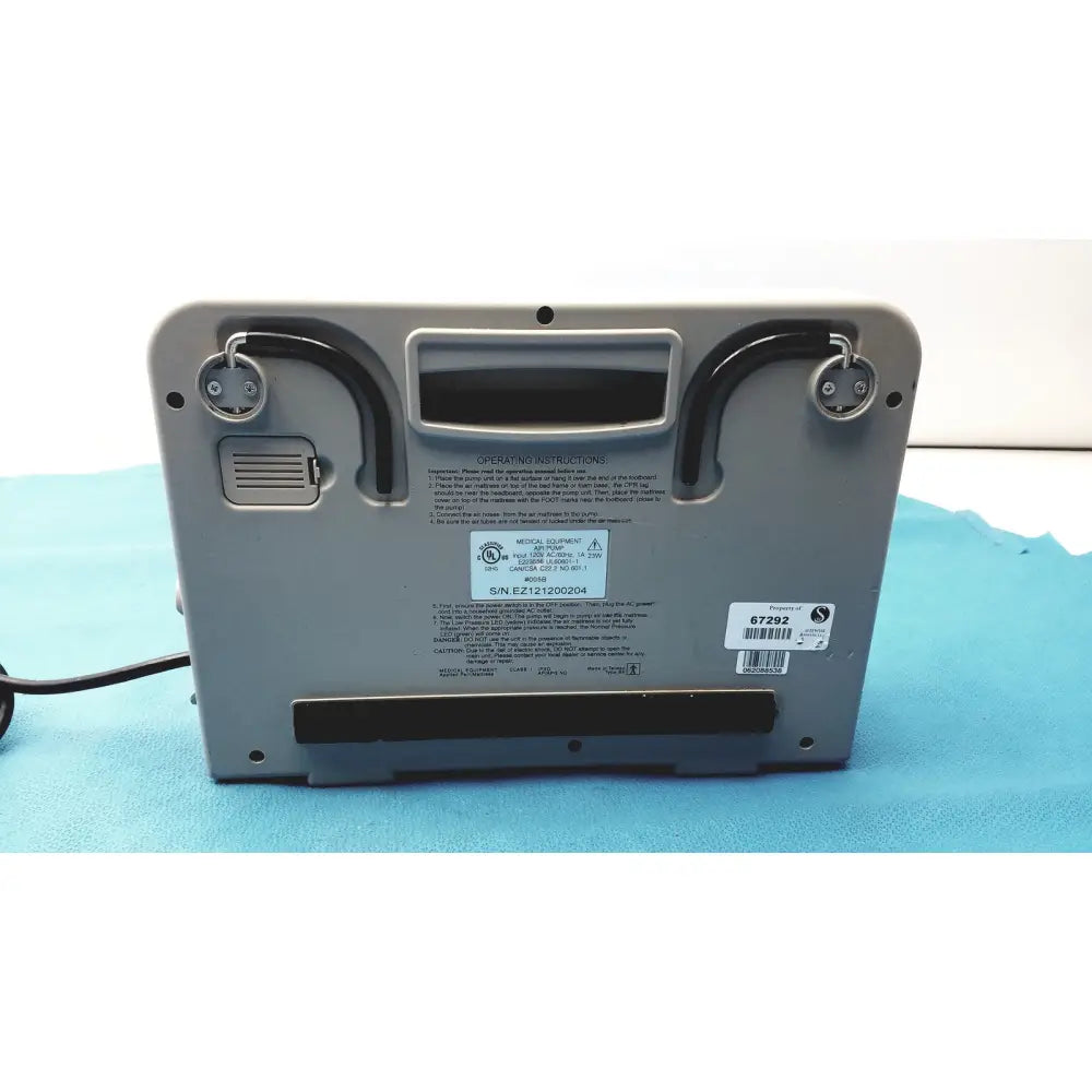 Gray plastic sizewise medical equipment air pump sw-ampmax-cp with black tubing and label showing operating instructions