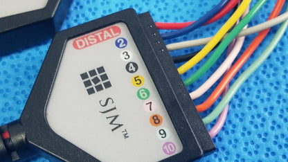 Black distal sim medical diagnostic connection cable with white label and color-coded ports for reuse medical equipment