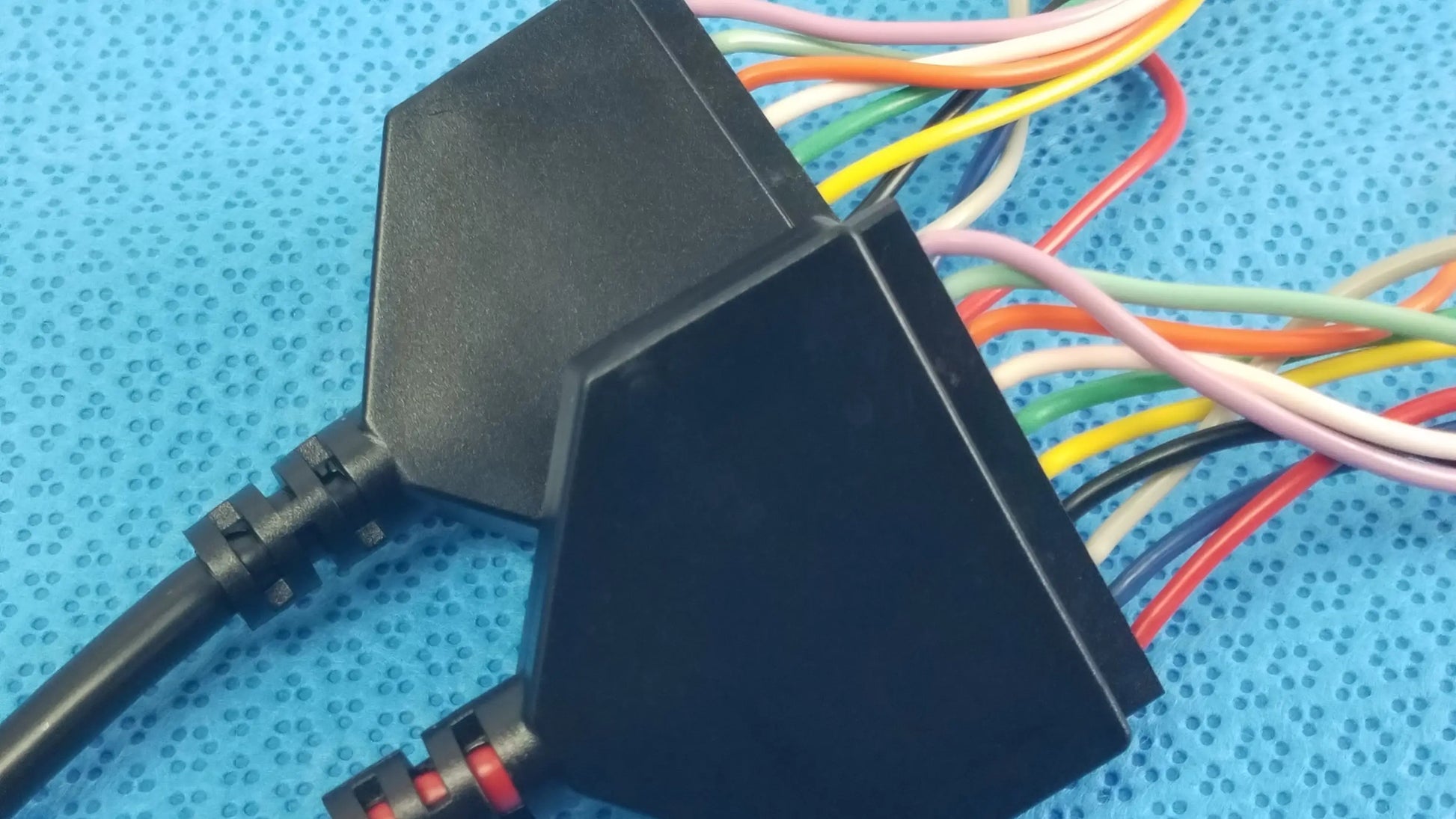 Black plastic multiport connector with colorful wires for reuse medical equipment in SJM St Jude Medical diagnostic cable