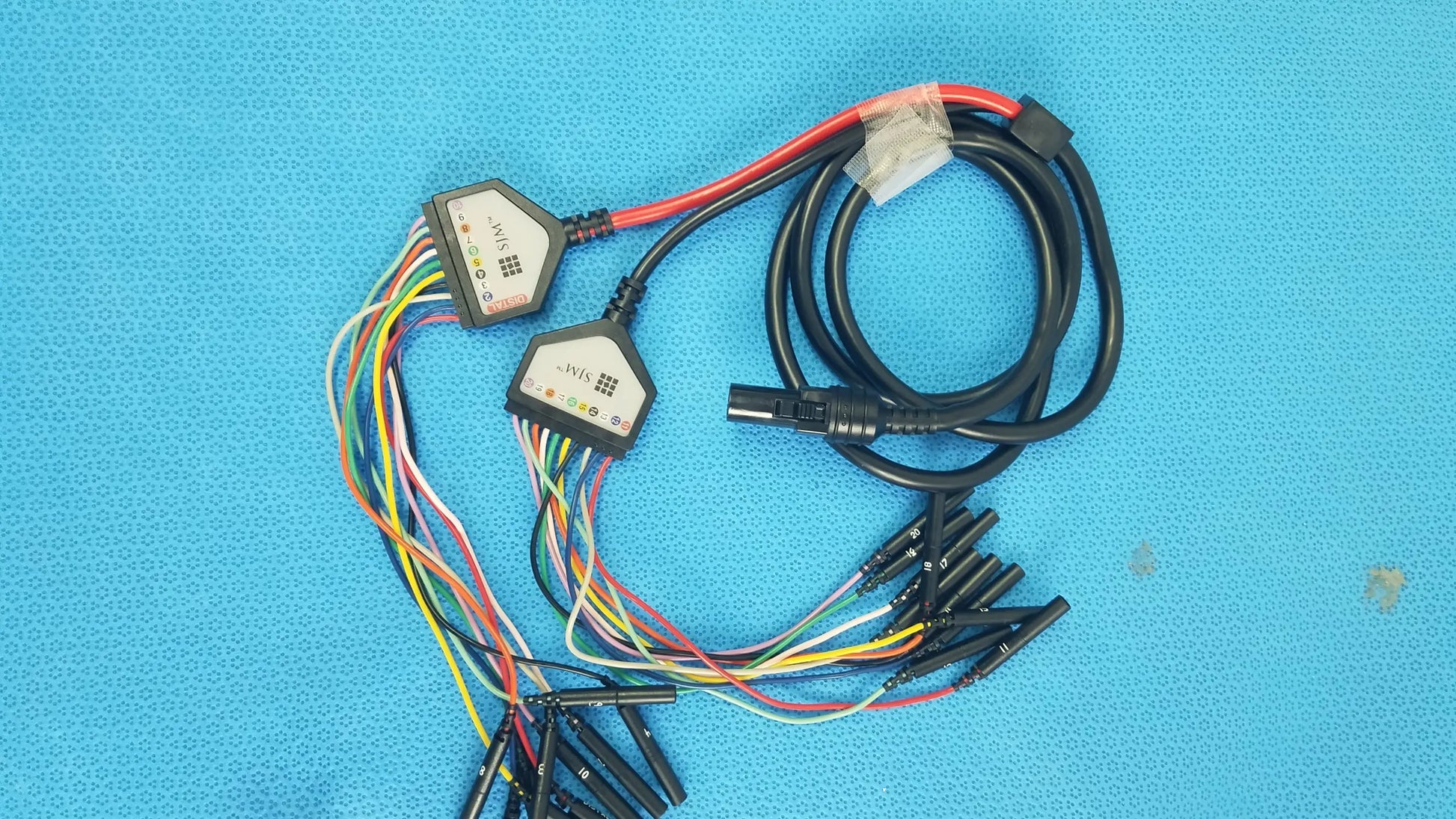 SJM St Jude Medical diagnostic connection cable with black and red wiring and two black Wii connectors for medical equipment reuse