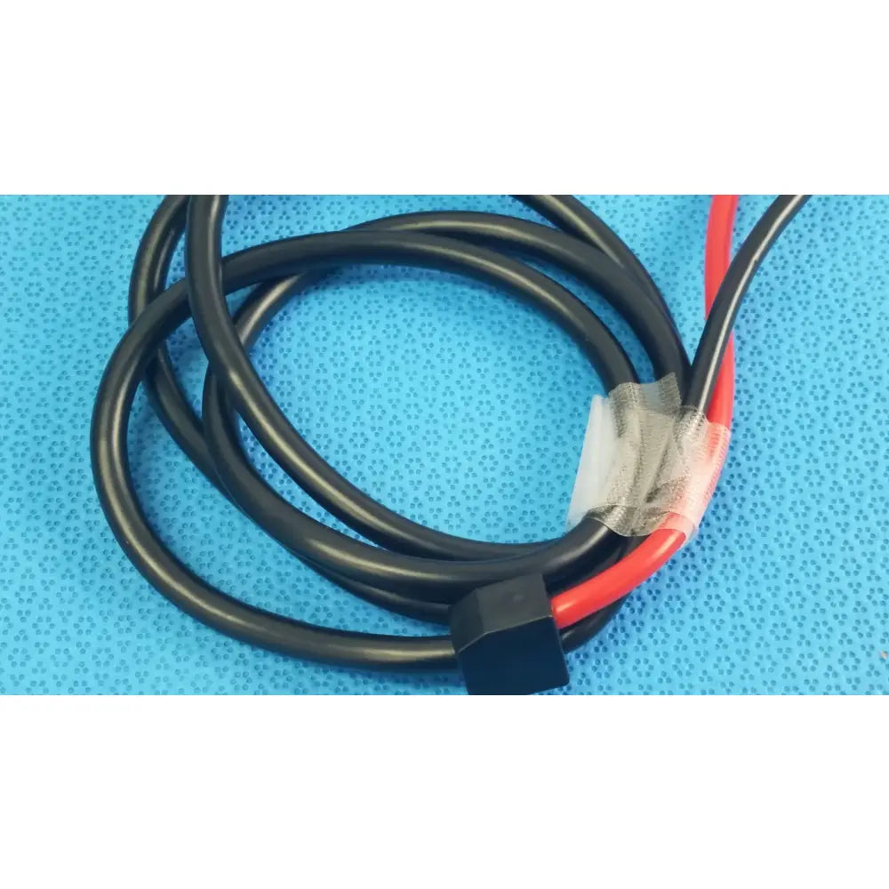 Sjm St Jude Medical diagnostic connection cable with black and red insulated wires and black plastic connector for medical equipment reuse