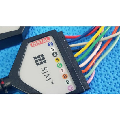 Black distal sim medical diagnostic connection cable with white label and color-coded ports for reuse medical equipment