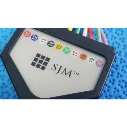 Black plastic sjm st jude medical diagnostic connection cable with numbered colored connectors for reuse medical equipment