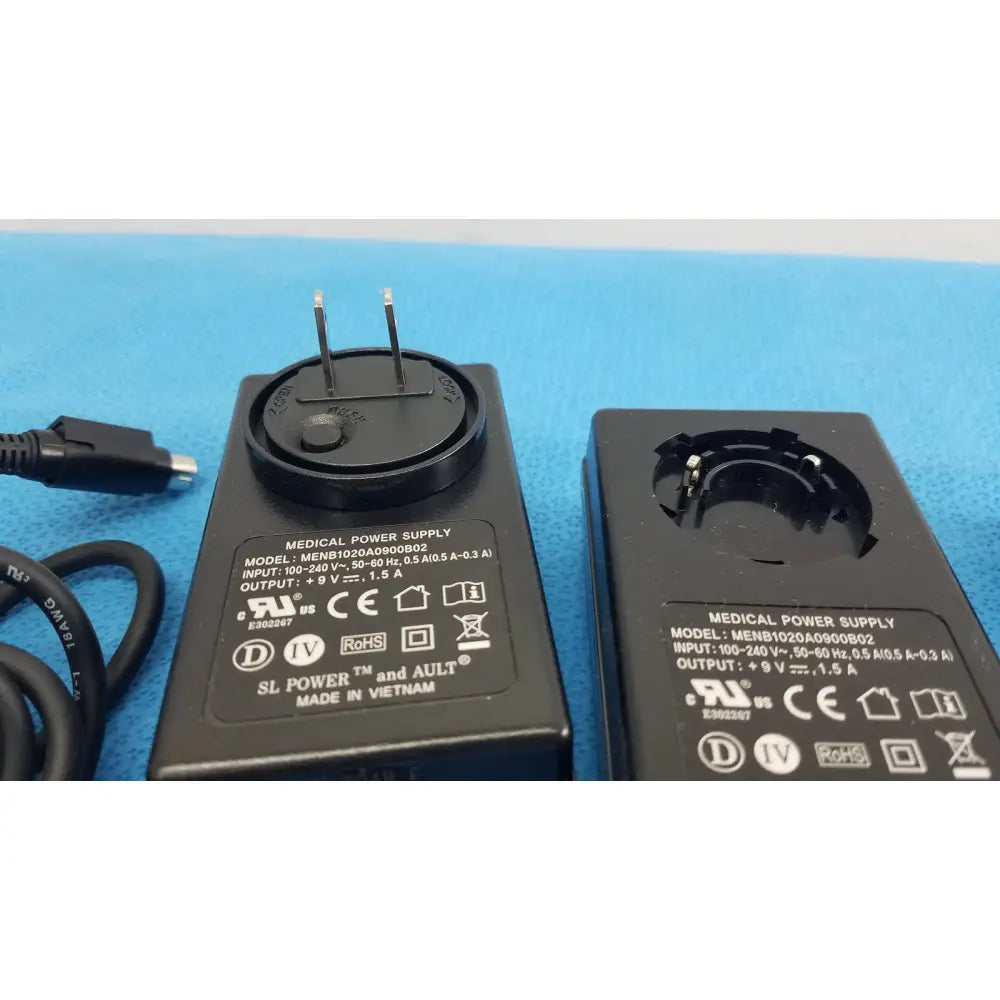 Black plastic medical power supply menb1020a0900b02 adapter with three-prong plug and coiled cable lot of 2