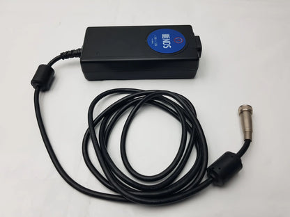 Black Philips NDS power supply with coiled cable and metallic connector for medical power supply MW155RA2400F02