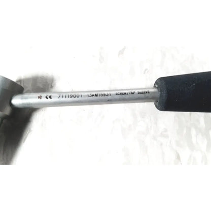 Silver metal cannulated screw set sleeve with black rubber grip handle from smith & nephew screw set instrument tray missing piece