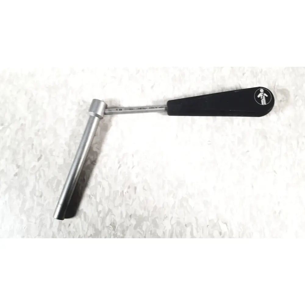Black-handled metallic cannulated screw set instrument with cylindrical head and circular logo for smith & nephew set instrument tray missing piece