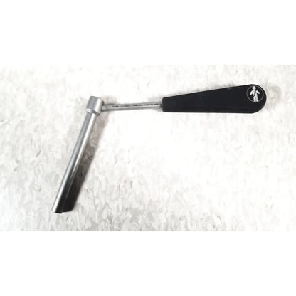 Black-handled metallic cannulated screw set instrument with cylindrical head and circular logo for smith & nephew set instrument tray missing piece