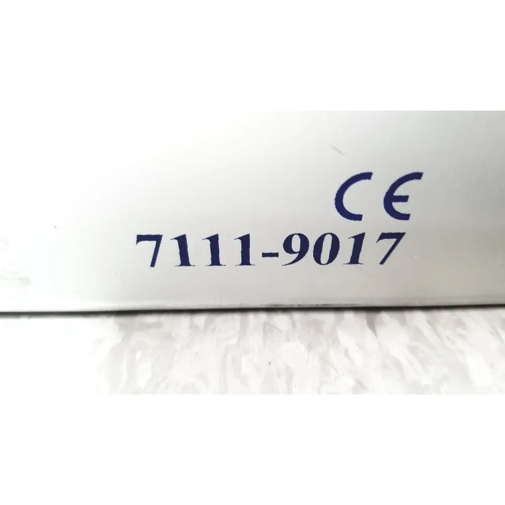 White plastic surface with blue ce marking 7111-9017 on smith & nephew 5.5 mm cannulated screw set instrument tray missing piece