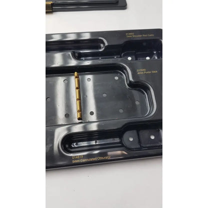 Gold-colored 5mm cannulated obturator with metallic finish and holes for nephew endoscopy portal accessory system 7207113