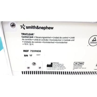 Smith & nephew truclear hysteroscopic morcellator console white with black text and multilingual labeling for surgical use