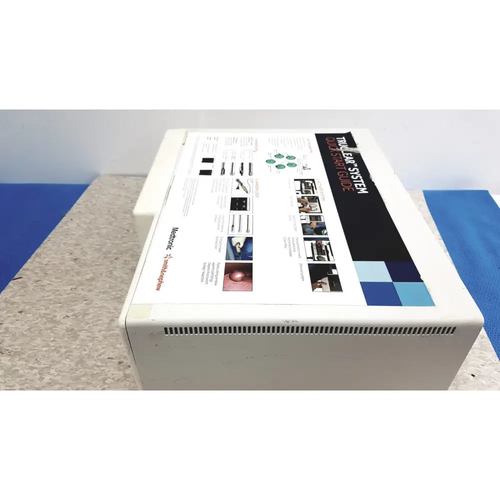 White rectangular box with printed turbo ear system and quick start guide for nephew truclear hysteroscopic morcellator console