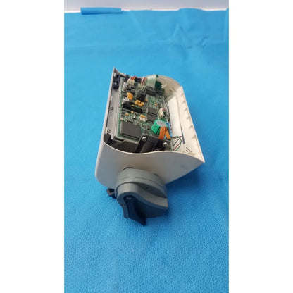 White plastic housing with exposed green circuit board and electronic components inside smiths medfusion 3010a rotating pole clamp