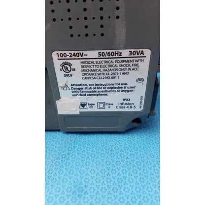 Gray medical electrical equipment label with ul and cul safety marks on the back of smiths medfusion 3500 with rotating pole clamp