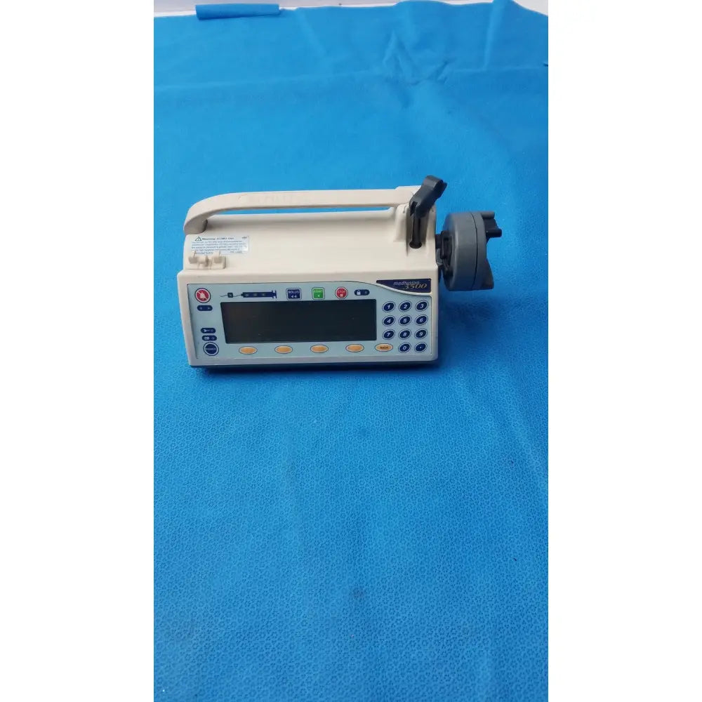 Beige smiths medfusion 3500 medical infusion pump with digital display keypad handle and rotating pole clamp