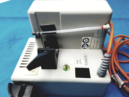 White plastic dental handpiece with black components and orange power cord for smiths medical hl-390 fluid warmer medical equipment
