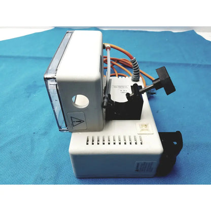 White plastic dental handpiece with transparent cover and black knob in smiths medical HL-390 fluid warmer medical equipment