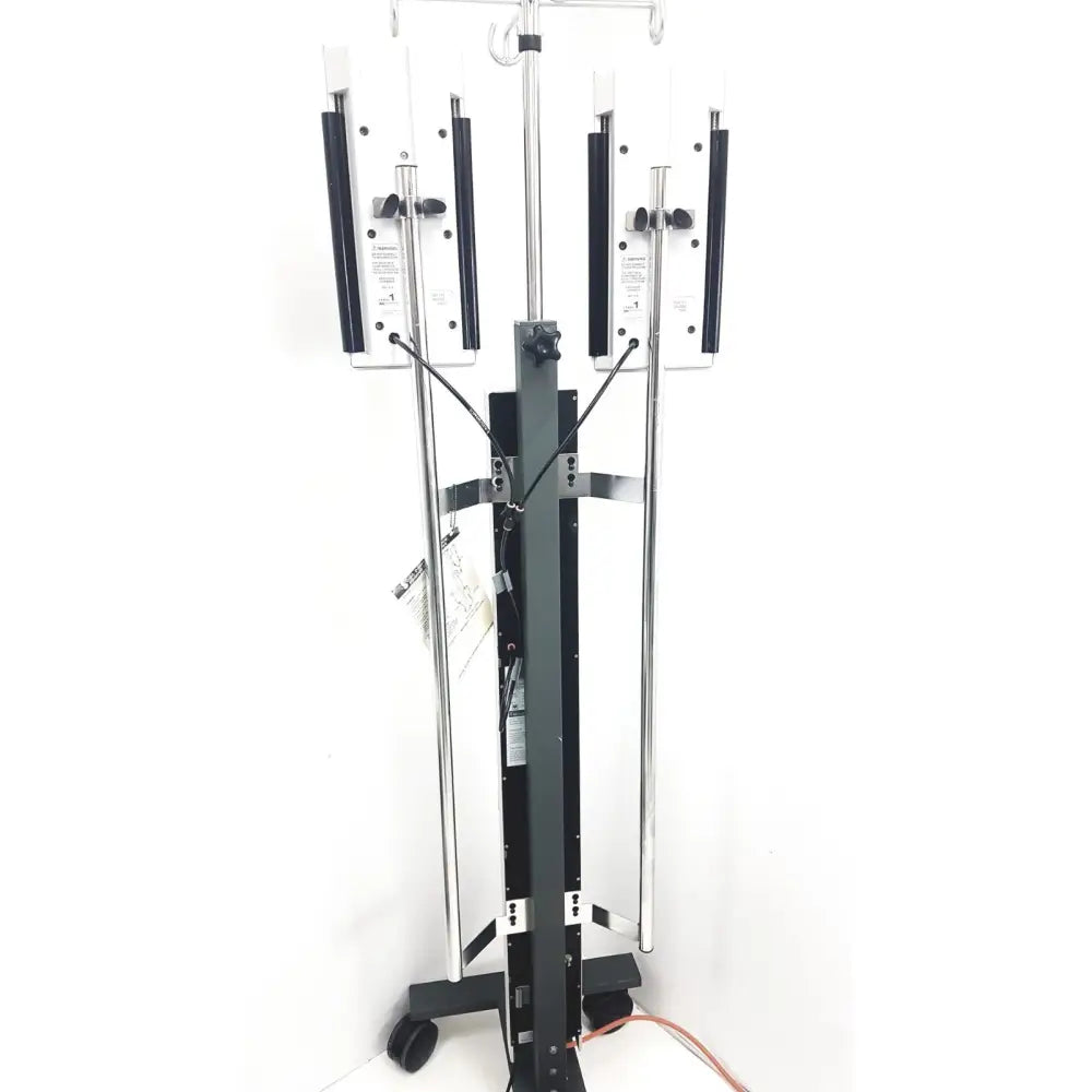 Black and silver iv pole with four adjustable arms for fluid administration in smiths medical level 1 fluid warming system