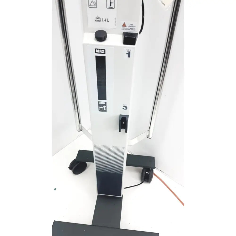White and black max brand vertical water heater with digital display and control panel in smiths medical level 1 fluid warming system