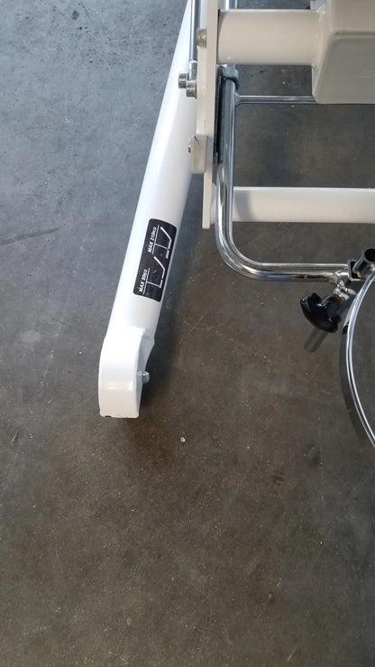 White metal leg with chrome accents and black knobs of the Sonesta S3 ultimate patient positioning procedure chair