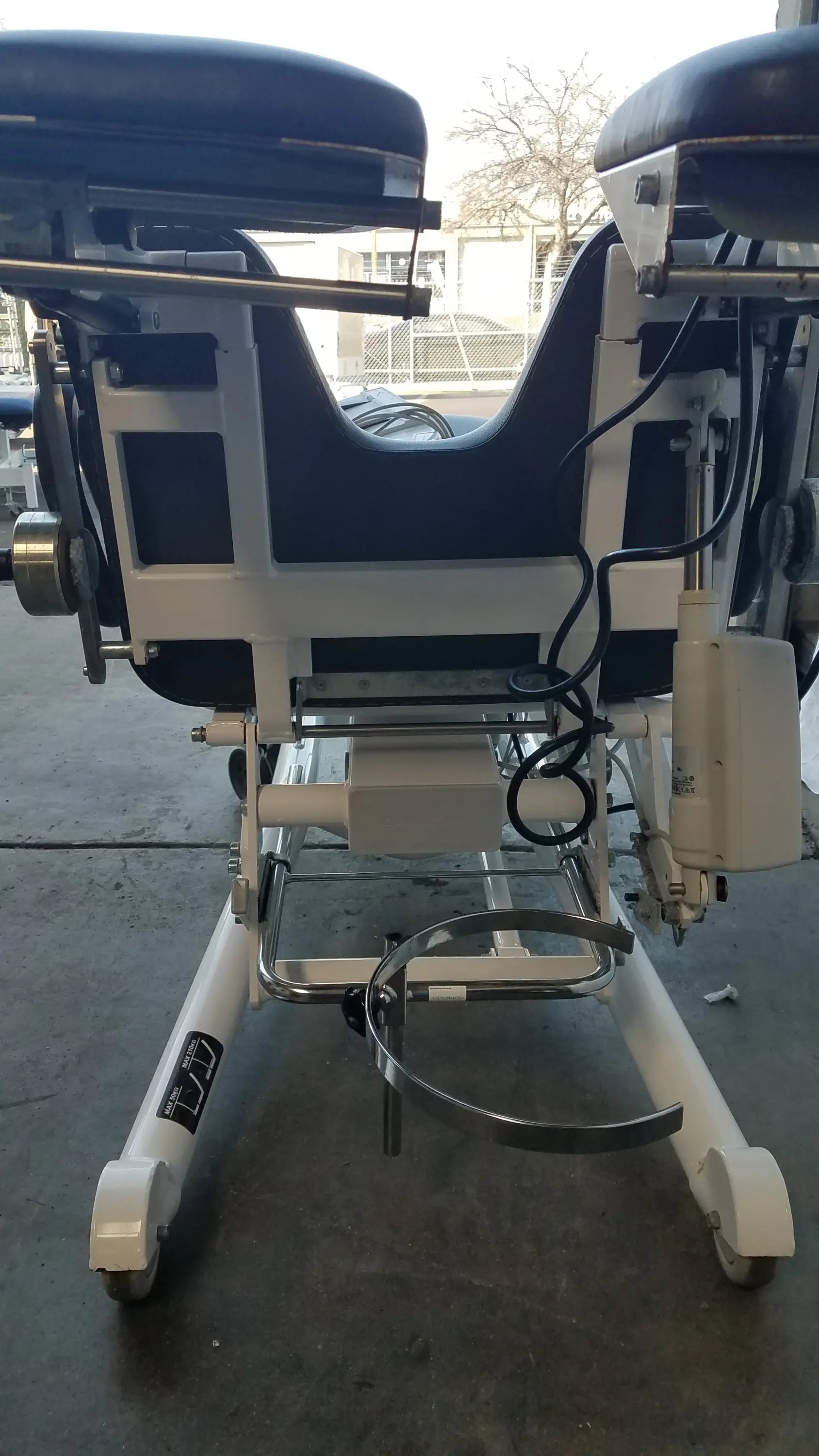 Sonesta S3 ultimate patient positioning procedure chair in blue and white with adjustable medical examination features