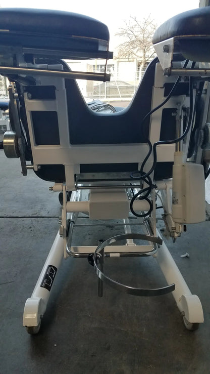 Sonesta S3 ultimate patient positioning procedure chair in blue and white with adjustable medical examination features