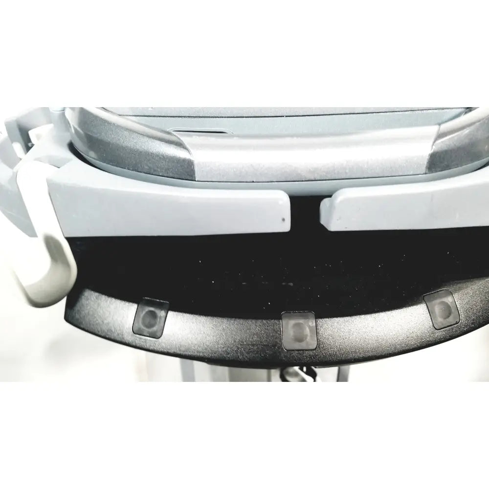 Silver and black plastic car seat headrest with molded contours and integrated clips for sonosite m-turbo portable ultrasound system