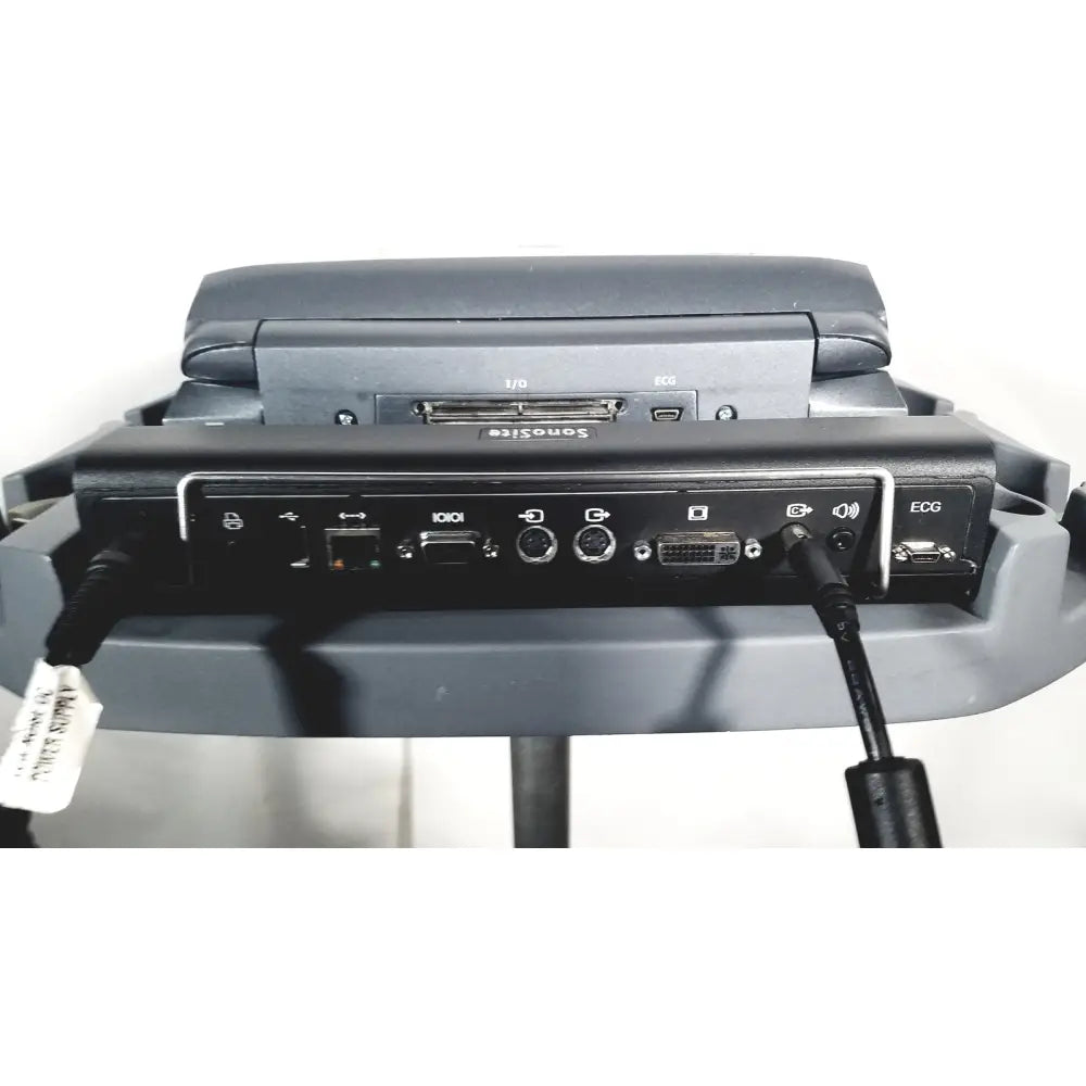 Black sonosite m-turbo portable ultrasound system showing multiple ports and connected cables on the back side