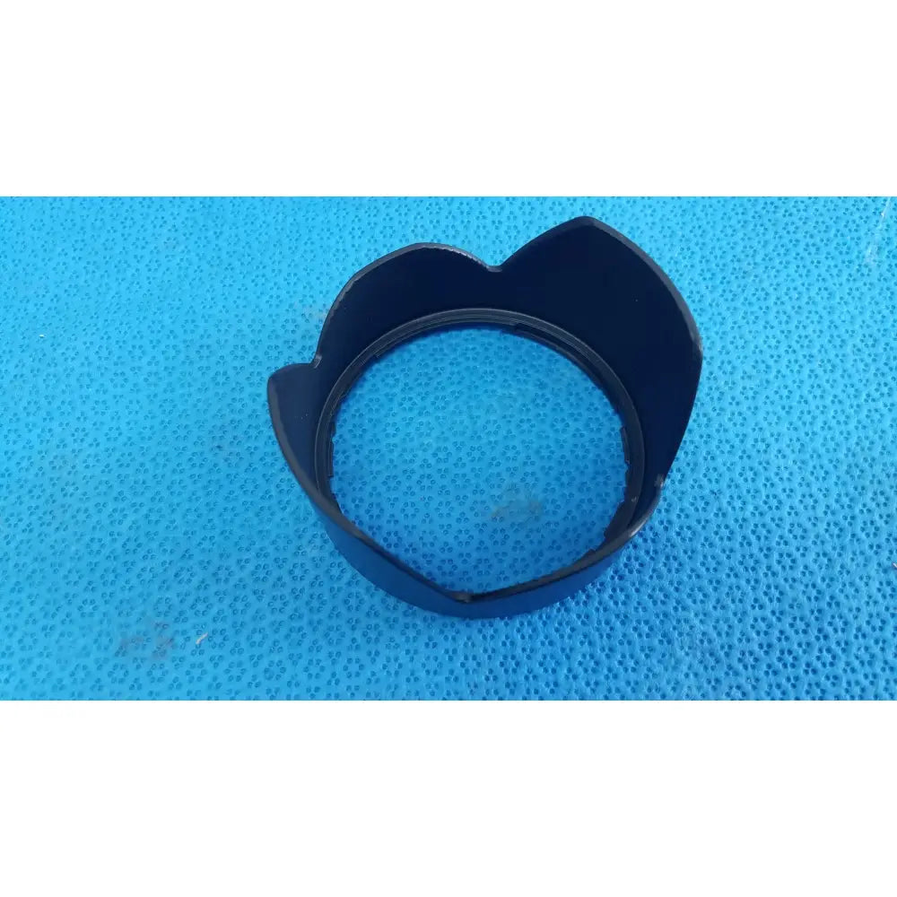 Black plastic petal-shaped camera lens hood for sony cyber-shot dsc-f828 digital still camera with ac power adapter